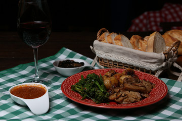 Italian dinner with breads, water and wine, table tidy