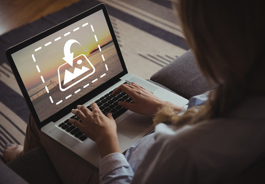 Laptop User Sitting on a Couch 1
