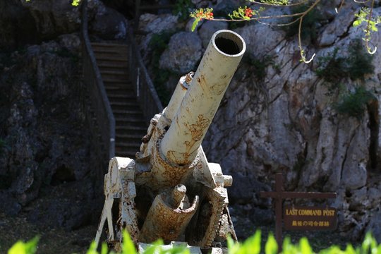 Old Japanese cannon at the Last Command Post, Saipan The relics of a Japanese canon displayed at the Last Command Post in Marpi, northern part of Saipan is one of the top tourist attractions