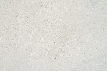 White plaster wall texture. Empty bright plaster background