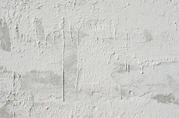 White plaster wall texture. Empty bright plaster background