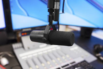 Microphone in modern radio station broadcasting studio