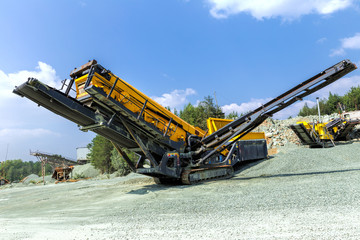 Open pit mining and processing plant for crushed stone, sand and gravel to be used in the roads and construction industry