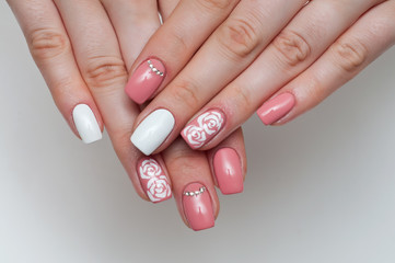 Pink white manicure. Manicure with crystals. Wedding manicure. Delicate white roses.