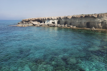 Fototapeta na wymiar Sea caves of Cavo greco cape. Cyprus landscape