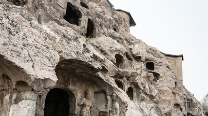 carved slope of grottoes in West Hill in Longmen