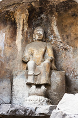 carved statue in Longmen Grottoes