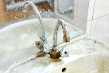 rusty dirty sink