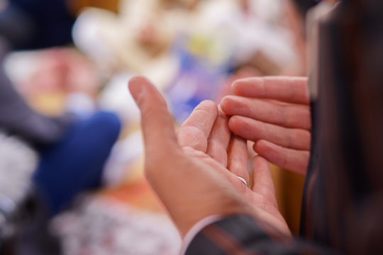 Muslim man praying for god at ramadan, or wedding.