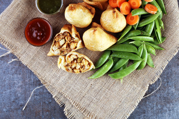 Indian special traditional street food punjabi samosa or Coxinha, Croquete and other Fried Brazilian Snacks