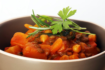Lentil with carrot and potato in a grey bowl. Healthy lifestyle. Diet menu