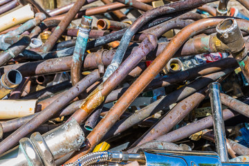 Recycling metals industry, a pile of scrap metal copper ready to be recycled.
