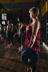 Obraz na płótnie Canvas Workout in a fitness gym