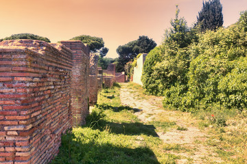 Archaeological Roman site sunset landscape in Ostia Antica - Rome - Italy