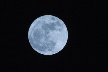 blue full moon on the dark night 