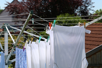 Washing clothes washed on a rope .