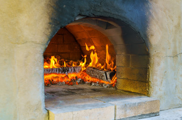 Obraz premium Glimpse wood fire oven before the pizza comes in