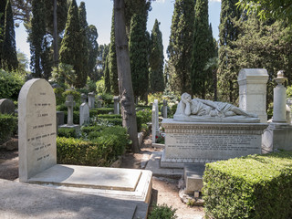 View of the famous Protestant Cemetery in Rome with tombs and trees