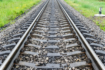 Fototapeta premium Railroad track into the distance.