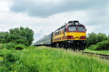 Passenger train with a diesel locomotive.