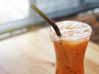 A glass of thai iced tea. Delicious Thai traditional drink.