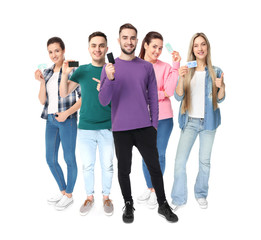 Fototapeta premium Group of people holding blank business cards on white background