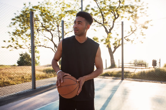 Man playing basketball, street ball, man playing, sport competitions, afro, outdoor portrait,sport games,handsome black man,pretty,man holding ball