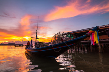 Fototapeta premium Fishing boat In the evening sea