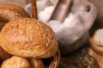 Basket with delicious bread, closeup