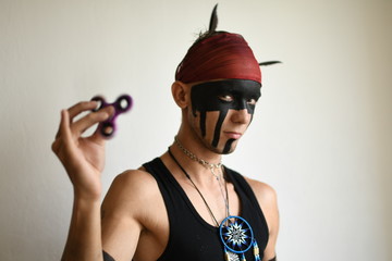 man holding popular fidget spinner toy 