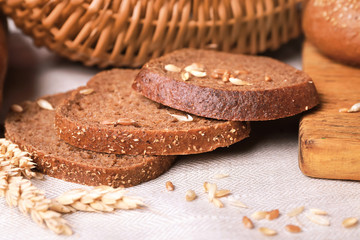 Delicious sliced rye bread on table, closeup