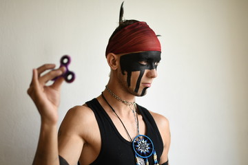 man holding popular fidget spinner toy 