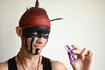 man holding popular fidget spinner toy 