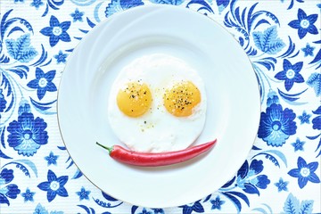 Funny eggs with red chile pepper 