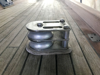 Yacht deck and metal bollards.