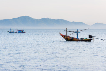 Fishing boat in the morning sea