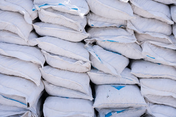 Stacks of cement bags, closeup