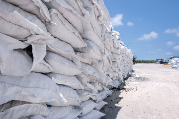 Stacks of cement bags, closeup