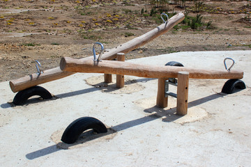 Wooden seesaw in a park