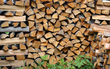 Stack of firewood. big pile of firewood for furnace, background.