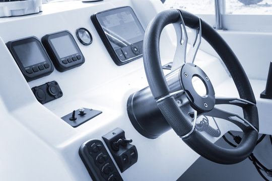 Control panel with wheel on speedboat