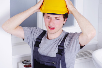 Verzweifelter Handwerker 