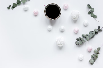 woman lunch with marsh-mallow and flowers soft light on white table background flat lay mock-up