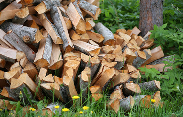 Stack of firewood. big pile of firewood for furnace, background.