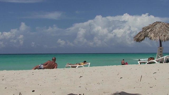 People relaxing on Cuban beach