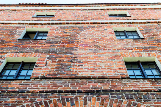 Old red brick tenement house