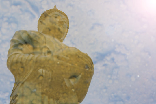 Water reflection, Buddha, alms.