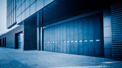modern business building in financial district with empty square/pavement/space