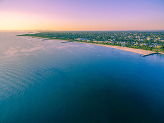 Aerial view of Port Phillip Bay and Melbourne coastline at dusk
