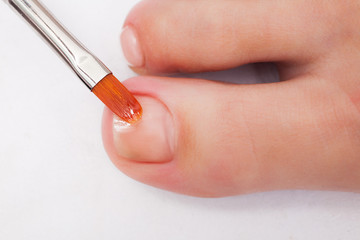 pedicure process and spa procedure macro closeup. Concept body care. 
